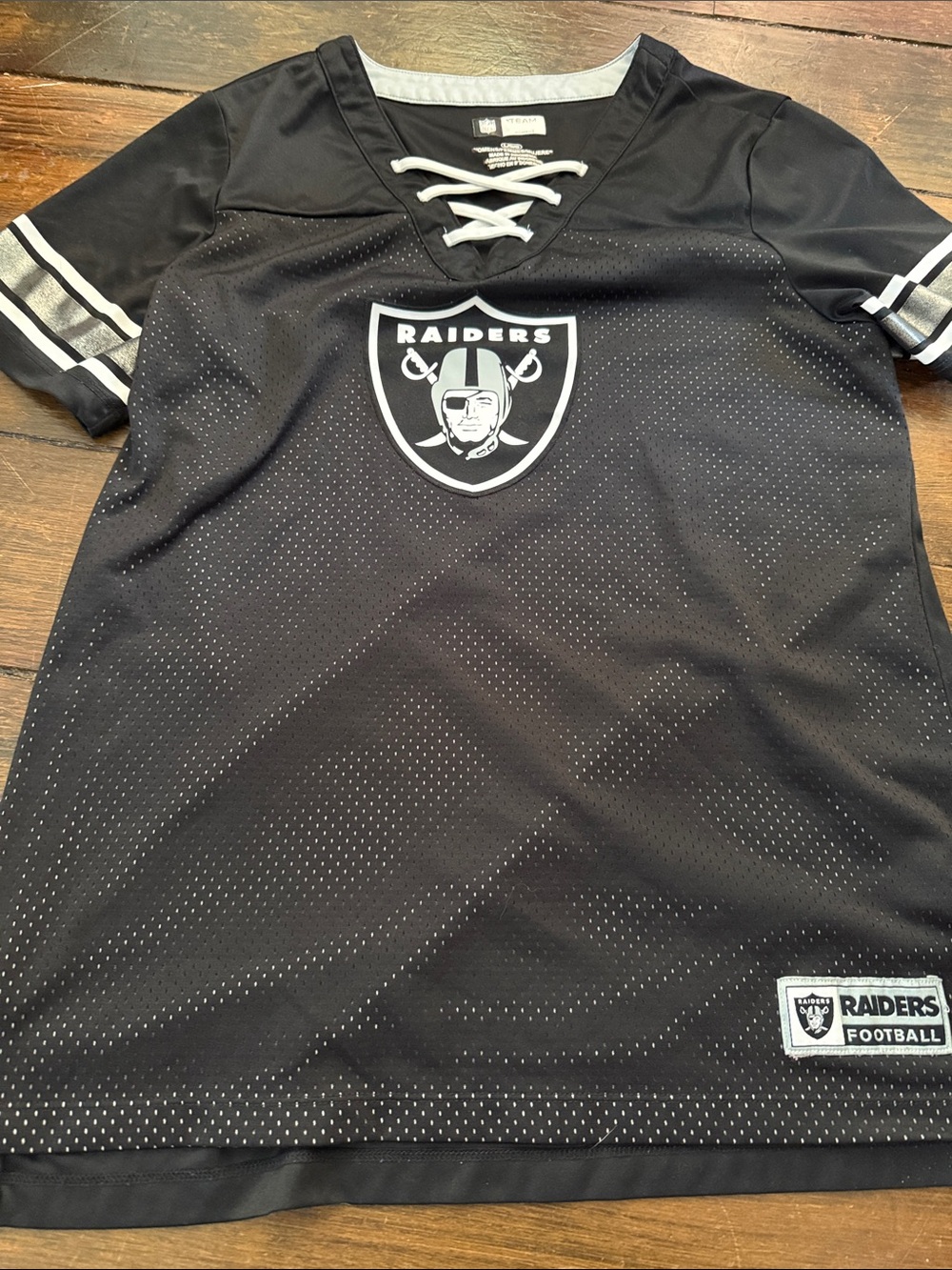 NFL Raiders Black and White Lace-Up V-Neck Women's Jersey Top